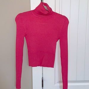 Fitted pink turtleneck